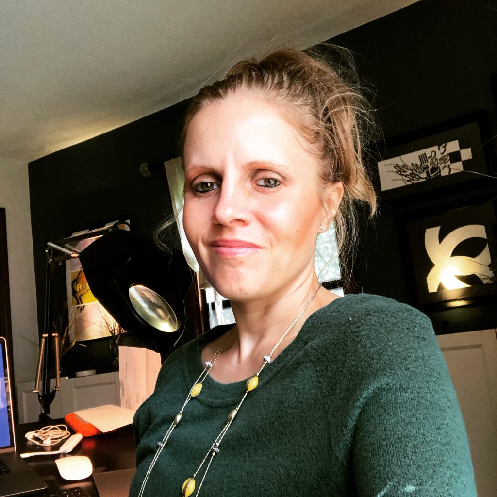 Amy Heidbreder at work in her studio at home.