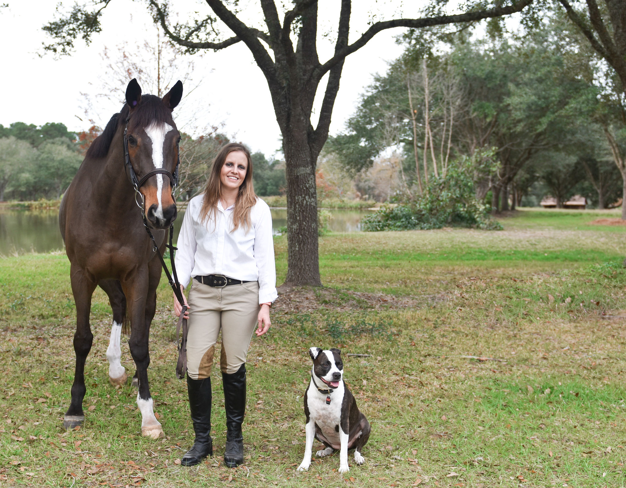 Me standing next to my horse and dog.