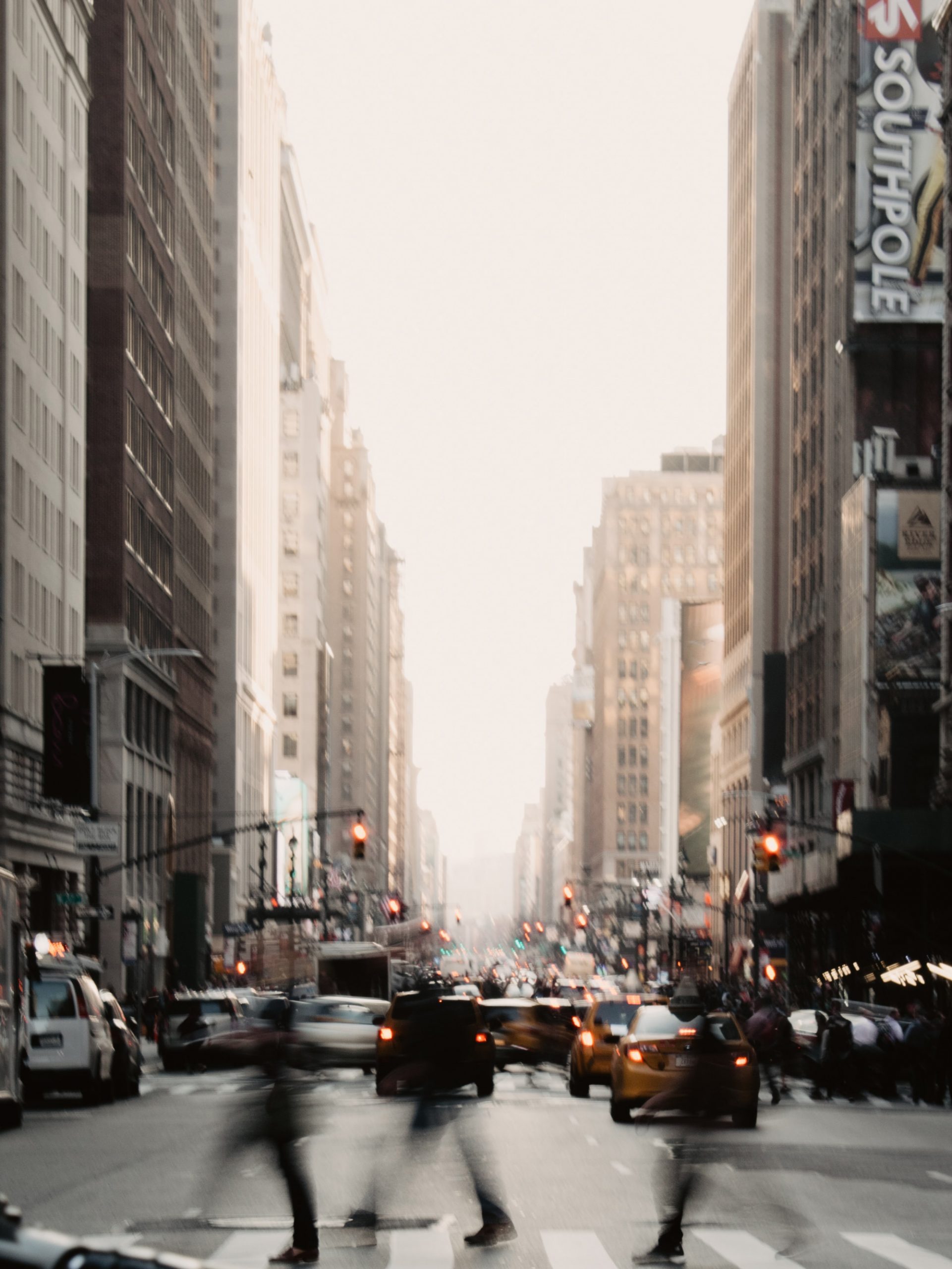 Tastefully blurred photo of a busy crosswalk in Lower Manhattan.